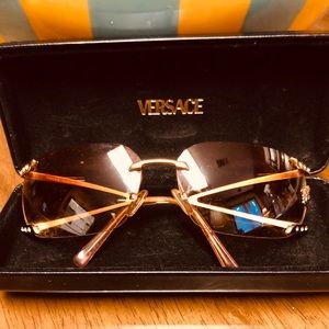 VERSACE ROSE GRADIENT LENS IN GOLD ....$127 OR OBO
